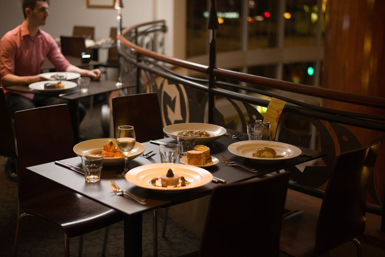 A set dining table inside The Little Snail Restaurant